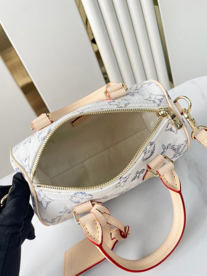 LOUIS VUITTON SPEEDY BANDOULIÈRE 20 IN WHITE MONOGRAM JACQUARD FABRIC AND BEIGE CALFSKIN TRIM