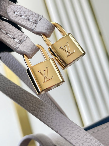 LOUIS VUITTON FLORE 28 IN WHITE PERFORATED CALFSKIN
