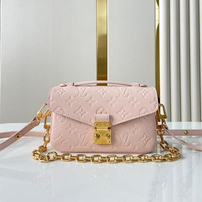 LOUIS VUITTON POCHETTE MÉTIS EAST WEST 21 IN PINK OPALE MONOGRAM ECLIPSE CANVAS GOLD BUCKLE