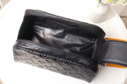 LOUIS VUITTON DOPP KIT TOILETRY BAG 28 CM IN BLACK TAURILLON MONOGRAM LEATHER