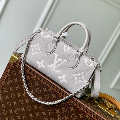 LOUIS VUITTON ONTHEGO EAST WEST BAG 25 IN BICOLOR MONOGRAM EMPREINTE LEATHER