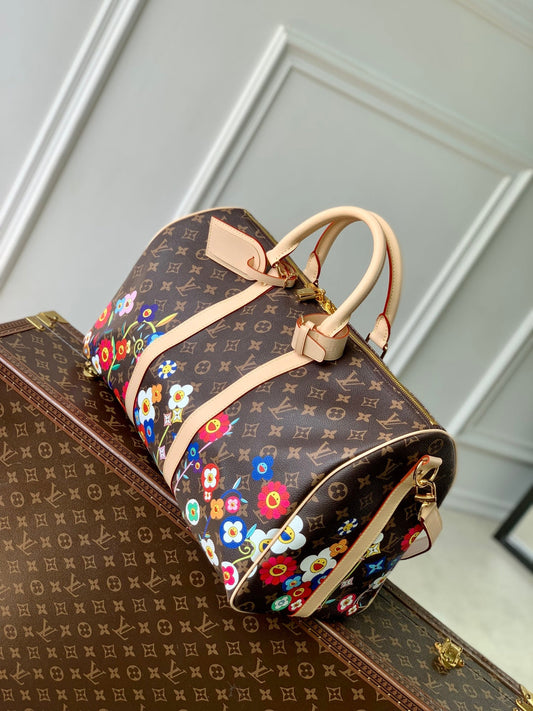 LOUIS VUITTON KEEPALL BANDOULIÈRE  FLORAL 45 IN BROWN MONOGRAM COATED CANVAS