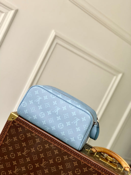 LOUIS VUITTON DOPP KIT 28 IN BLUE MONOGRAM COATED CANVAS