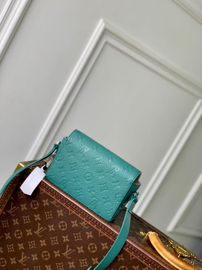 LOUIS VUITTON STEAMER WEARABLE WALLET 18 IN TEAL GREEN MONOGRAM TAURILLON CALFSKIN