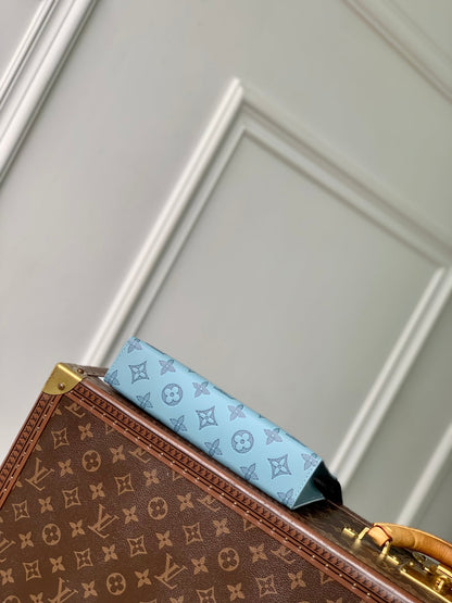 LOUIS VUITTON GASTON WEARABLE WALLET 22 IN SKY BLUE MONOGRAM SHADOW CALFSKIN EMBOSSED LOGO
