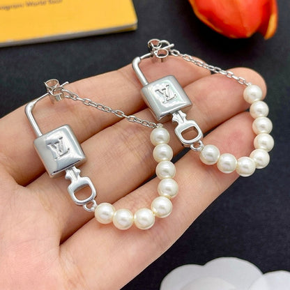 18K Louis Vuitton Pearl Lock Gold Earrings