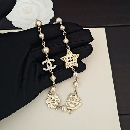 18K  Chanel Pearl Star Necklace