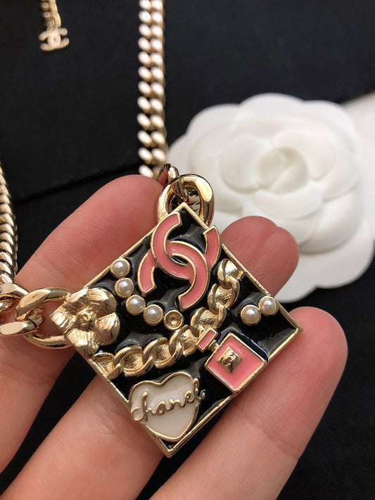 18K  Chanel Pink Logo Chain Necklace