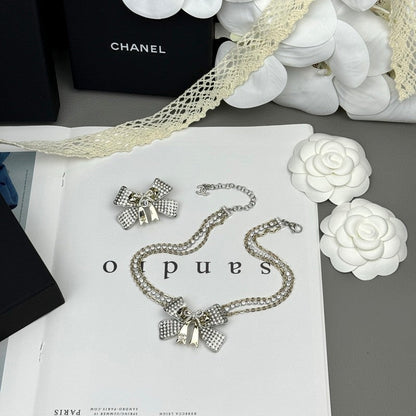18K  Chanel 25K Bow Tie Choker Necklace