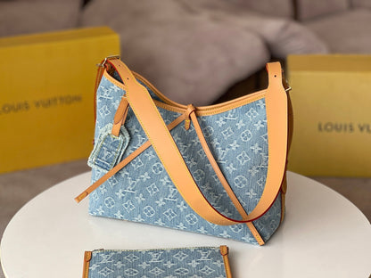 LOUIS VUITTON LV 25S CARRYALL 29 IN LIGHT BLUE DENIM MONOGRAM LEATHER TRIM