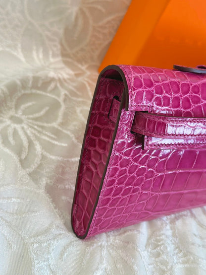 HERMES KELLY CUT 31 IN MAGENTA PURPLE SHINNY ALLIGATOR LEATHER WITH SILVER HARDWARE