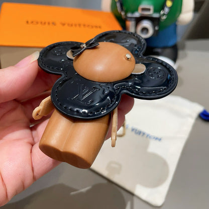 LOUIS VUITTON LV KEYCHAIN IN BLACK CALFSKIN AND WOOD