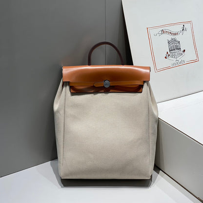 HERMES HERBAG A DOS ZIP RETOURNE BACKPACK 29 IN OFF-WHITE CANVAS AND BROWN CALFSKIN