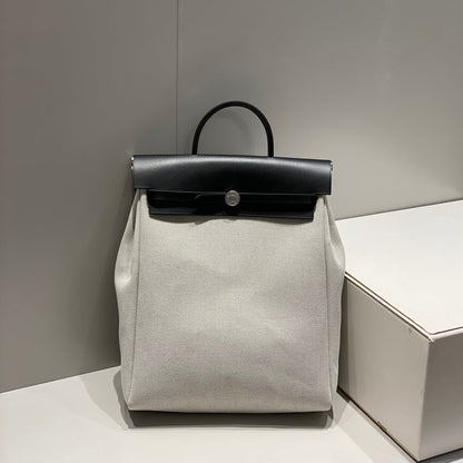HERMES HERBAG A DOS ZIP RETOURNE BACKPACK 29 IN OFF-WHITE CANVAS AND BLACK CALFSKIN