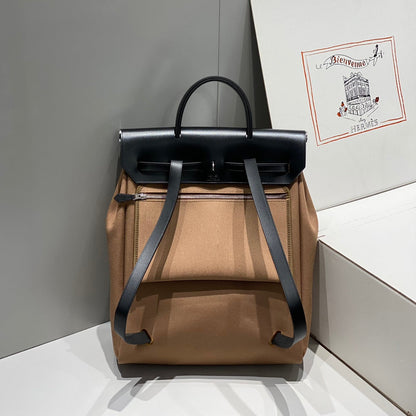 HERMES HERBAG A DOS ZIP RETOURNE BACKPACK 29 IN BROWN CANVAS AND BLACK CALFSKIN