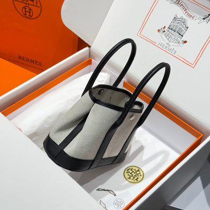 HERMES GARDEN PARTY 23CM IN WHITE TOILETS COTTON CANVAS AND BLACK CALFSKIN