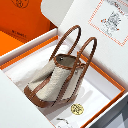 HERMES GARDEN PARTY 23CM IN WHITE TOILETS COTTON CANVAS AND BROWN CALFSKIN