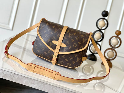 LOUIS VUITTON SAUMUR BB 28 IN BROWN MONOGRAM CANVAS AND LEATHER TRIM GOLD HARDWARE