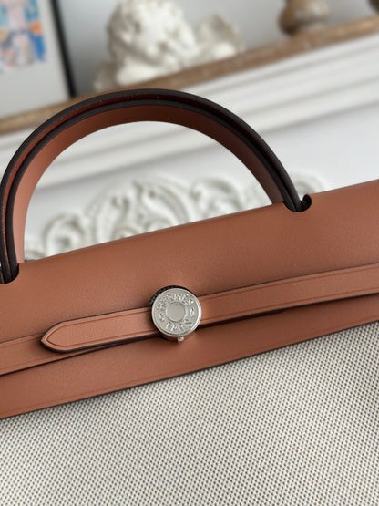 HERMES ZIP CABINE 31 BAG IN PALE GRAY CANVAS AND BRONZE BROWN CALFSKIN
