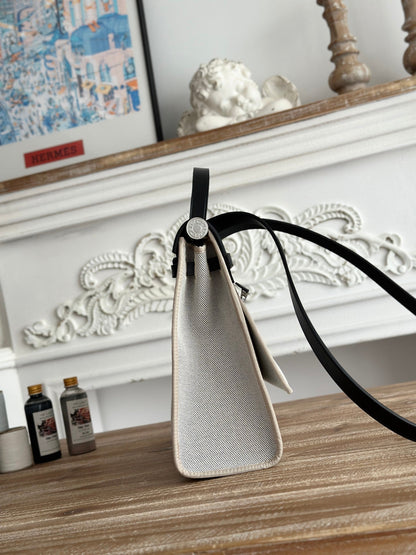 HERMES ZIP CABINE 31 BAG IN PALE GRAY CANVAS AND BLACK CALFSKIN
