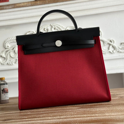 HERMES ZIP CABINE 31 BAG IN RUBY RED CANVAS AND BLACK CALFSKIN