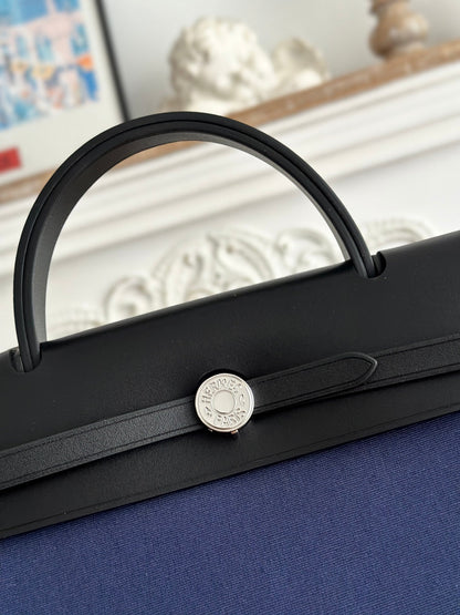 HERMES ZIP CABINE 31 BAG IN NAVY BLUE CANVAS AND BLACK CALFSKIN