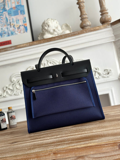 HERMES ZIP CABINE 31 BAG IN NAVY BLUE CANVAS AND BLACK CALFSKIN