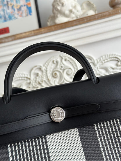 HERMES ZIP CABINE 31 BAG IN BLACK MIX WHITE CANVAS AND CALFSKIN