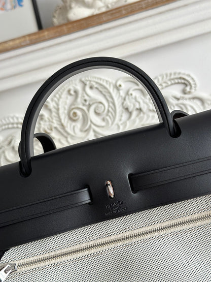HERMES ZIP CABINE 31 BAG IN WHITE CANVAS AND BLACK CALFSKIN