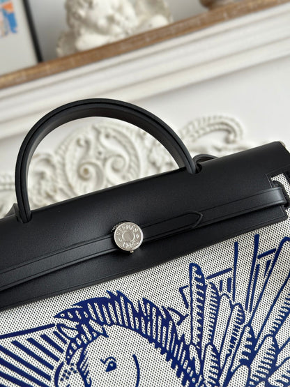 HERMES ZIP CABINE 31 BAG IN WHITE CANVAS AND BLACK CALFSKIN