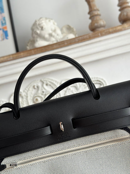 HERMES HERBAG ZIP 31 LAQUERED BAG IN OFF-WHITE MIX BLACK H PLUME CANVAS