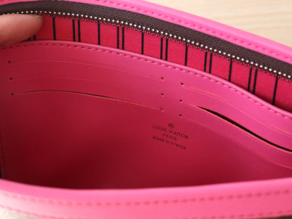LOUIS VUITTON LV 25S POCHETTE VOYAGE 26 IN PONDICHERY PINK MONOGRAM MACASSAR COATED CANVAS