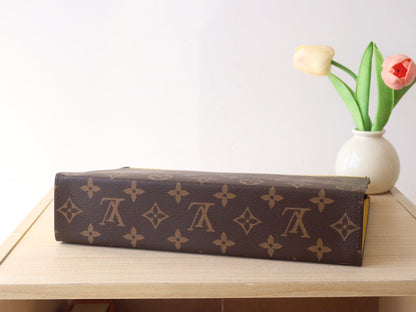 LOUIS VUITTON LV 25S POCHETTE VOYAGE 26 IN YELLOW MONOGRAM MACASSAR COATED CANVAS