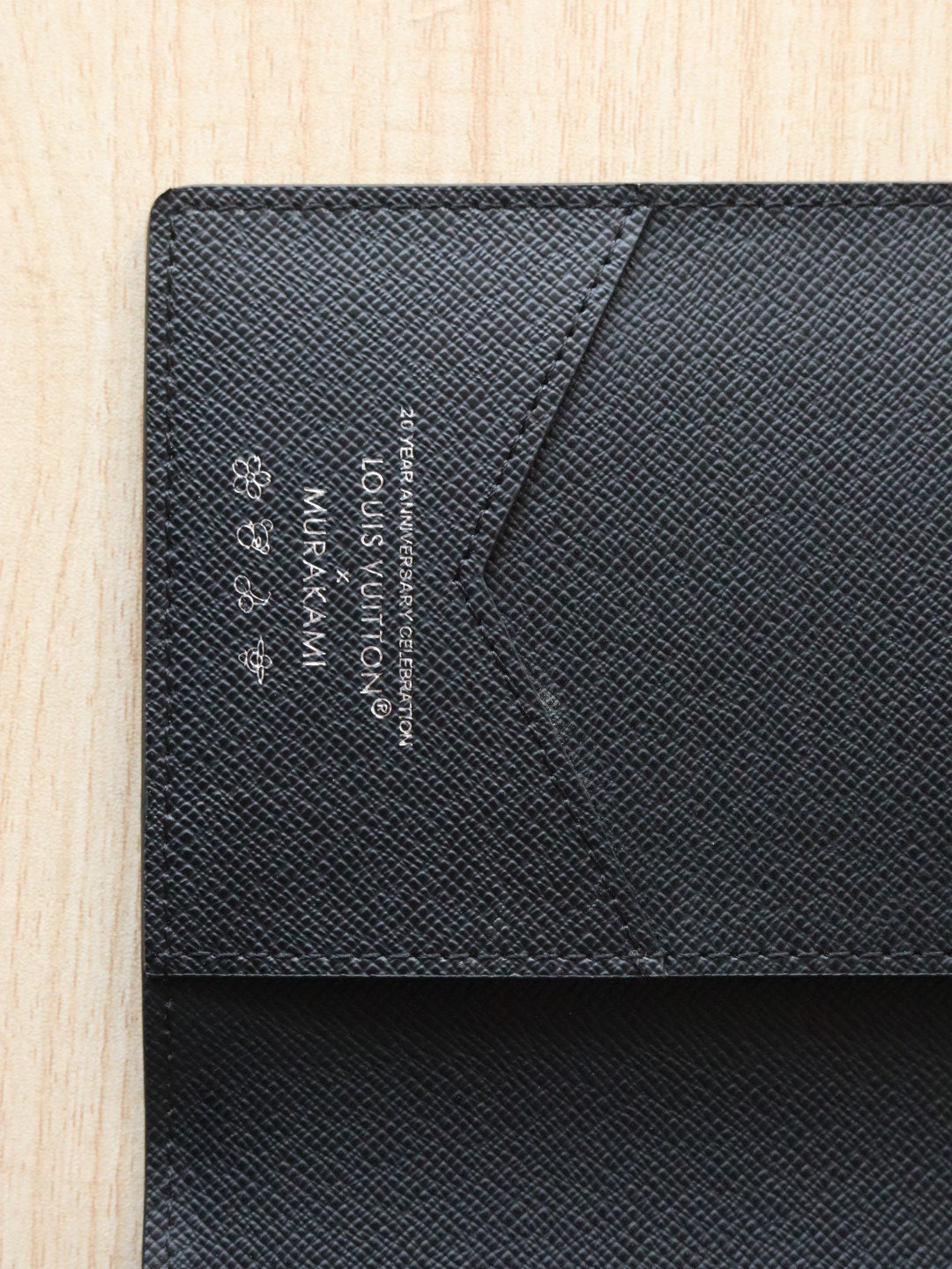 LOUIS VUITTON DOLL PASSPORT WALLET IN BLACK MIX COLORFUL CALFSKIN