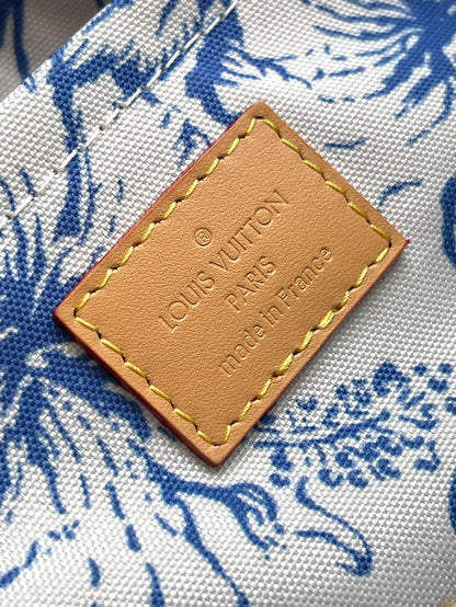 LOUIS VUITTON ONTHEGO EAST WEST 25 IN LAGOON BLUE MONOGRAM TILES CANVAS