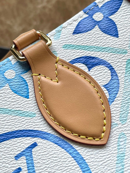 LOUIS VUITTON ONTHEGO EAST WEST 25 IN LAGOON BLUE MONOGRAM TILES CANVAS