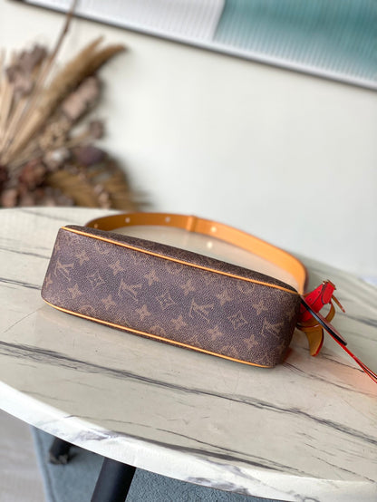 LOUIS VUITTON POCHETTE ACCESSOIRE XL 28 IN BROWN MONOGRAM DUST CANVAS