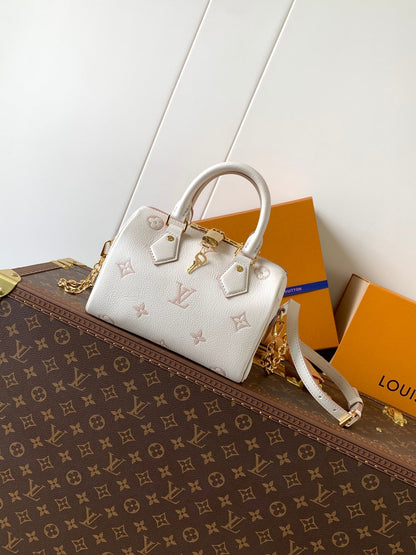 LOUIS VUITTON SPEEDY BANDOULIÈRE 21 IN WHITE AND PINK MONOGRAM CANVAS