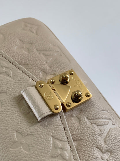 LOUIS VUITTON POCHETTE MÉTIS EAST WEST 22 IN LIGHT BEIGE MONOGRAM EMPREINTE CALFSKIN EMBOSSED