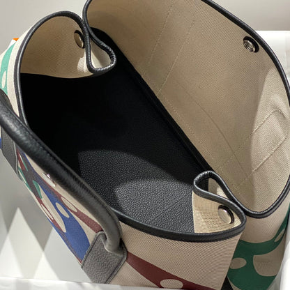 HERMES GARDEN PARTY 36 IN MULTICOLOR TOILE H CANVAS BLACK CALFSKIN OVERLAPPING POLKA RINGS PRINT