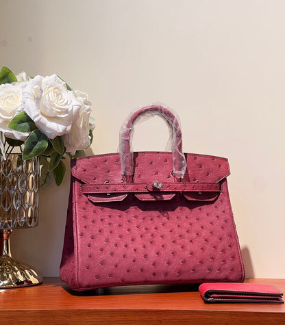 HERMES KELLY SELLIER 25 BAG IN CURRANT RED OSTRICH LEATHER WITH SILVER HARDWARE
