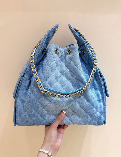 CHANEL 25 HANDBAG 40 IN BLUE DENIM GOLD HARDWARE