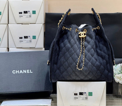 CHANEL 25 HANDBAG 40 IN DARK BLUE DENIM GOLD HARDWARE